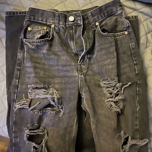 Black ripped jeans, boyfriend cut
